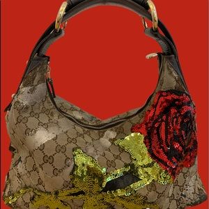 Gucci saddle bag ONE OF A KIND sequin rose…metallic paint.  Head turning!